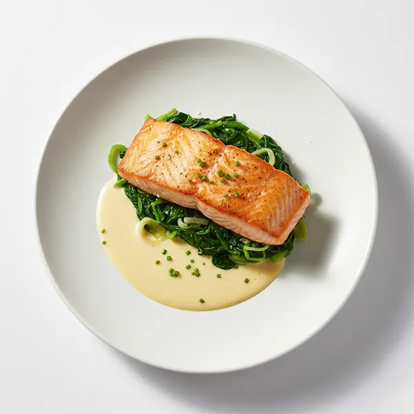 Pan-Seared Salmon with Braised Spinach Leek Mix & Beurre Blanc
